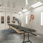 Pre-finishing shop to paint or stain windows and doors or mouldings prior to installation